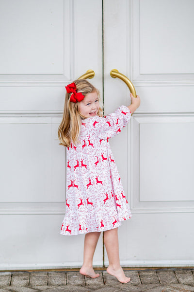 Little Girl Wearing Festive Dress with Custom Rudolph Print on Christmas Day