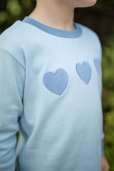 Close up of Grace and James Kids heart applique t-shirt set for valentines