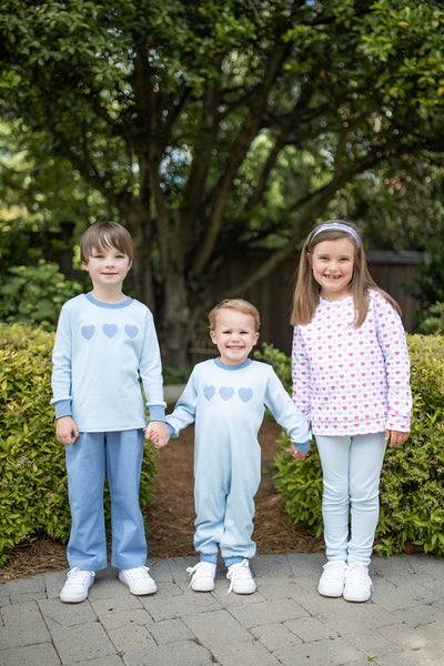 Group of children wearing Grace and James Kids valentines heart ourfits