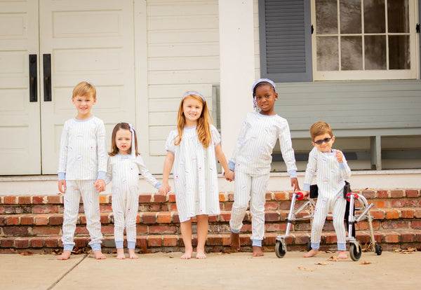 Children Wearing Matching Striped Loungewear Clothes