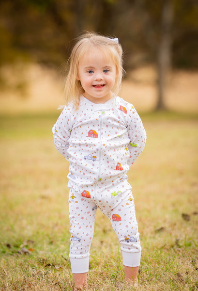 Little Girl Wearing Cozy Fall Harvest Loungewear Onesie