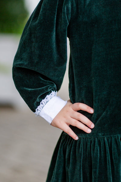 Close Up of Lace Details on White Cuffs on the Green Velvet Drop Waist Dress