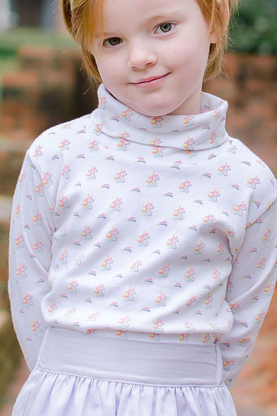 Girl Wearing the Unicorn Turtleneck with a Pink Skirt