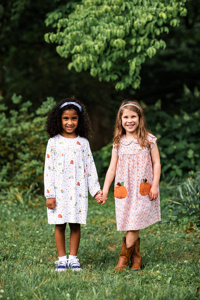 Little Girls Wearing Festive Fall Dresses