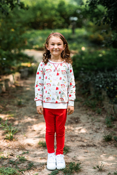 Girl Wearing Letters to Santa Crewneck and Matching Red Leggings
